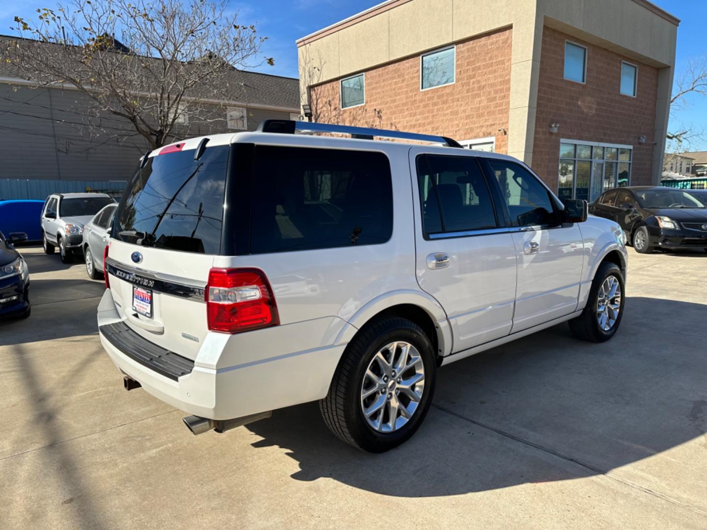 2015 White /Beige Ford Expedition Limited (1FMJU1KT5FE) with an 3.5L V6 DOHC 24V FFV engine, 6-Speed Automatic transmission, located at 1501 West 15th St., Houston, 77008, (713) 869-2925, 29.797941, -95.411789 - Photo#2